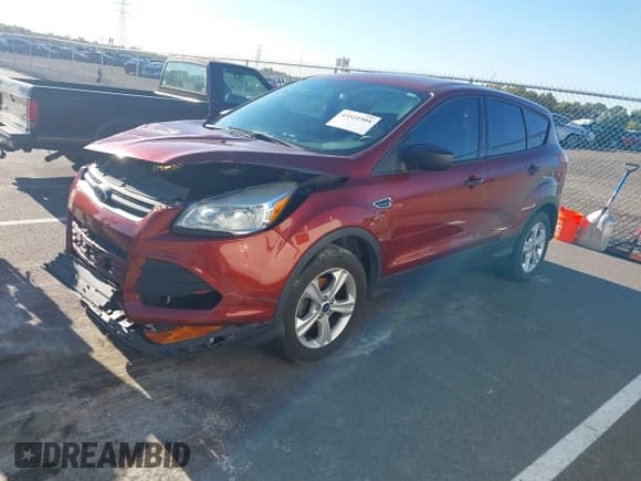 ✅ 2015 Ford Escape S • VIN: 1FMCU0F70FUC58974 • Lot: 43521504. Listed on IAAI with 131,788 mi. Free auction sales archive from the USA and detailed vehicle history report at DreamBid. Image 2.