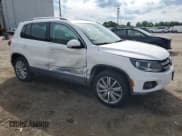 ✅ 2013 Volkswagen Tiguan SE • VIN: WVGBV7AX7DW512304 • Lot: 55928365. Listed on Copart with 142,520 mi. Free auction sales archive from the USA and detailed vehicle history report at DreamBid. Image 4.