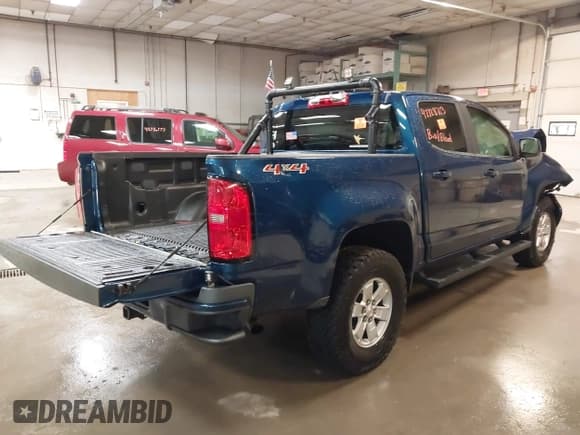✅ 2020 Chevrolet Colorado 4WD Work Truck • VIN: 1GCGTBENXL1136057 • Lot: 42728713. Listed on IAAI with 51,691 mi. Free auction sales archive from the USA and detailed vehicle history report at DreamBid. Image 4.