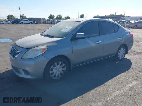 ✅ 2014 Nissan Versa S • VIN: 3N1CN7APXEK455119 • Лот: 43158129. Опубликован ранее на IAAI с пробегом 132 334 миль. Бесплатный доступ к архиву аукционных продаж из США и подробный отчёт об истории автомобиля на DreamBid. Изображение 2.