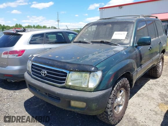 ✅ 2001 Toyota Land Cruiser • VIN: JTEHT05J612006883 • Lot: 42351679. Listed on IAAI with 177,690 mi. Free auction sales archive from the USA and detailed vehicle history report at DreamBid. Image 2.