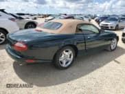 ✅ 1997 Jaguar XK • VIN: SAJGX274XVC013134 • Лот: 73891734. Опубликован ранее на Copart с пробегом Не указан. Бесплатный доступ к архиву аукционных продаж из США и подробный отчёт об истории автомобиля на DreamBid. Изображение 3.