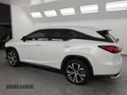 ✅ 2022 Lexus RX 350L • VIN: JTJHZKFA7N2038984 • Lot: 91164395. Wystawiony na Copart z przebiegiem 67 180 mil. Bezpłatny archiwum sprzedaży aukcyjnych z USA i szczegółowy raport historii pojazdu na DreamBid. Zdjęcie 2.