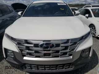 2023 Hyundai Santa Cruz SEL z VIN 5NTJB4AE2PH048940, wystawiony jako Copart lot #73878324 z przebiegiem Nie podano mil oraz Nie do naprawy • Non repairable. Historia ofert i sprzedaży dostępna na DreamBid. Obrazek 5.