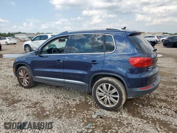 ✅ 2014 Volkswagen Tiguan S • VIN: WVGAV3AX7EW602185 • Lot: 70879275. Listed on Copart with 146,420 mi. Free auction sales archive from the USA and detailed vehicle history report at DreamBid. Image 2.