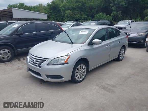 ✅ 2015 Nissan Sentra S • VIN: 3N1AB7AP6FY362810 • Lot: 42665973. Listed on IAAI with 180,464 mi. Free auction sales archive from the USA and detailed vehicle history report at DreamBid. Image 2.