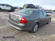 ✅ 2011 Ford Fusion Hybrid • VIN: 3FADP0L31BR145401 • Lot: 43676181. Wystawiony na IAAI z przebiegiem 89 242 mil. Bezpłatny archiwum sprzedaży aukcyjnych z USA i szczegółowy raport historii pojazdu na DreamBid. Zdjęcie 4.