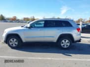 ✅ 2013 Jeep Grand Cherokee Laredo • VIN: 1C4RJFAG8DC607593 • Lot: 43643452. Listed on IAAI with 168,356 mi. Free auction sales archive from the USA and detailed vehicle history report at DreamBid. Image 14.