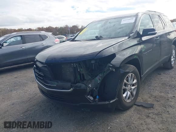 ✅ 2019 Chevrolet Traverse LT Cloth • VIN: 1GNERGKW7KJ221945 • Лот: 43559098. Опубликован ранее на IAAI с пробегом 142 243 миль. Бесплатный доступ к архиву аукционных продаж из США и подробный отчёт об истории автомобиля на DreamBid. Изображение 6.