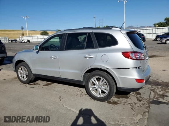 ✅ 2012 Hyundai Santa Fe Limited • VIN: 5XYZHDAG8CG120419 • Lot: 64593604. Listed on Copart with 94,740 mi. Free auction sales archive from the USA and detailed vehicle history report at DreamBid. Image 2.