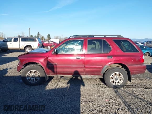 ✅ 2002 Isuzu Rodeo • VIN: 4S2DM58W624335632 • Лот: 41690735. Опубликован ранее на IAAI с пробегом 186 480 миль. Бесплатный доступ к архиву аукционных продаж из США и подробный отчёт об истории автомобиля на DreamBid. Изображение 15.