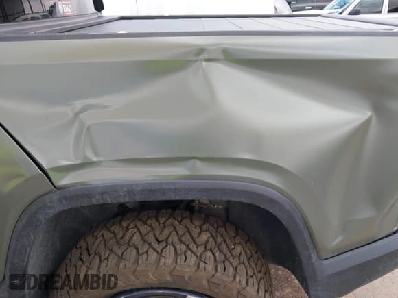 ✅ 2022 Rivian R1T Launch Edition • VIN: 7FCTGAAL8NN005099 • Лот: 42374412. Опубликован ранее на IAAI с пробегом Не указан. Бесплатный доступ к архиву аукционных продаж из США и подробный отчёт об истории автомобиля на DreamBid. Изображение 18.