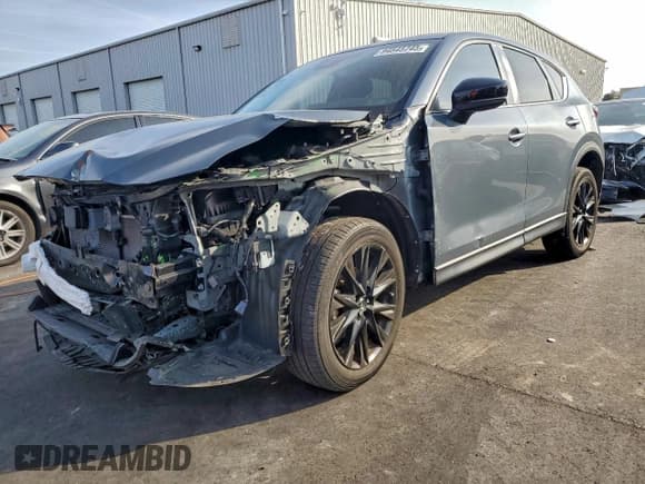 ✅ 2021 Mazda CX-5 Touring • VIN: JM3KFBCM2M0452532 • Lot: 94545745. Wystawiony na Copart z przebiegiem 39 281 mil. Bezpłatny archiwum sprzedaży aukcyjnych z USA i szczegółowy raport historii pojazdu na DreamBid. Zdjęcie 1.