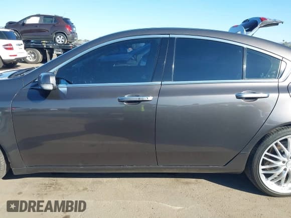 ✅ 2009 Acura TL Technology • VIN: 19UUA86569A018026 • Lot: 43584376. Listed on IAAI with 166,730 mi. Free auction sales archive from the USA and detailed vehicle history report at DreamBid. Image 14.