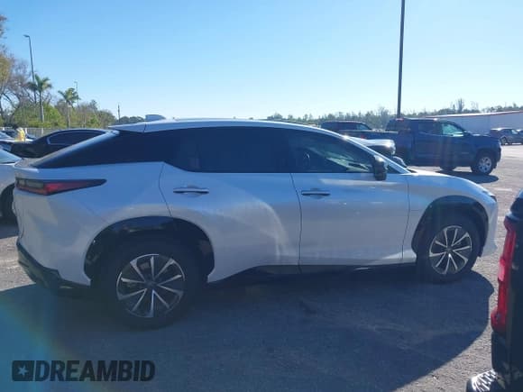 ✅ 2024 Lexus RZ 300e Premium • VIN: JTJABABB3RA002882 • Lot: 41262906. Listed on IAAI with 8,114 mi. Free auction sales archive from the USA and detailed vehicle history report at DreamBid. Image 14.