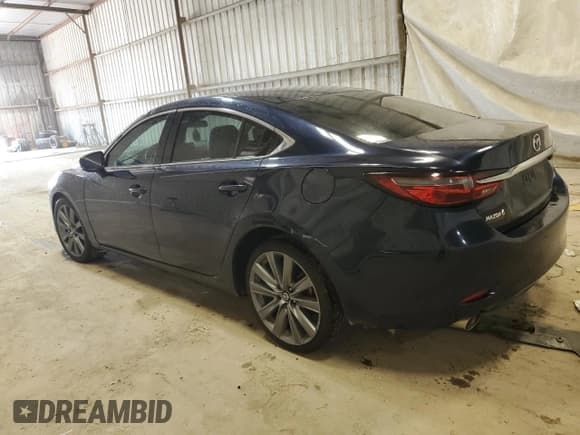 ✅ 2021 Mazda 6 Touring • VIN: JM1GL1VM6M1613523 • Лот: 69867735. Опубликован ранее на Copart с пробегом 92 116 миль. Бесплатный доступ к архиву аукционных продаж из США и подробный отчёт об истории автомобиля на DreamBid. Изображение 2.