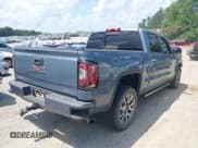 ✅ 2016 GMC Sierra 1500 Denali • VIN: 3GTP1PEC7GG118494 • Lot: 42567049. Listed on IAAI with 163,429 mi. Free auction sales archive from the USA and detailed vehicle history report at DreamBid. Image 4.