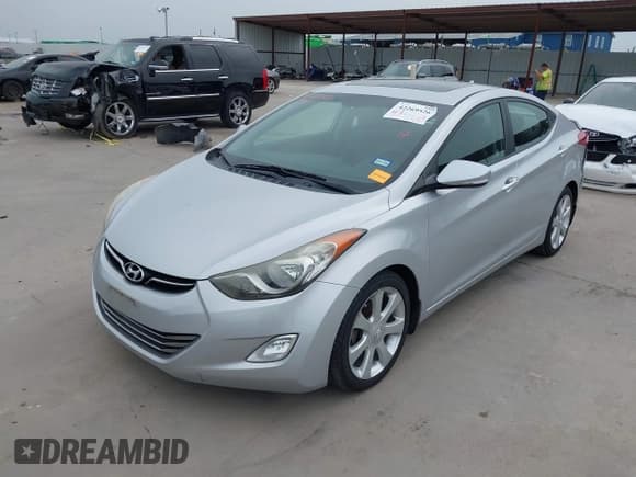 ✅ 2013 Hyundai Elantra GLS • VIN: 5NPDH4AE7DH268063 • Lot: 42269526. Listed on IAAI with 123,067 mi. Free auction sales archive from the USA and detailed vehicle history report at DreamBid. Image 2.
