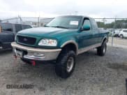 ✅ 1997 Ford F-150 XL • VIN: 1FTEX18L2VND33137 • Lot: 43578023. Wystawiony na IAAI z przebiegiem 148 923 mil. Bezpłatny archiwum sprzedaży aukcyjnych z USA i szczegółowy raport historii pojazdu na DreamBid. Zdjęcie 2.
