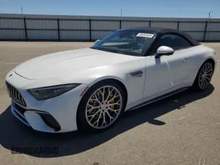 ✅ 2022 Mercedes-Benz SL 63 AMG • VIN: W1KVK8BB9NF009660 • Лот: 59253424. Опубликован ранее на Copart с пробегом 16 594 миль. Бесплатный доступ к архиву аукционных продаж из США и подробный отчёт об истории автомобиля на DreamBid. Изображение 1.