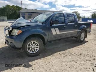 2014 Nissan Frontier Desert Runner z VIN 1N6AD0ER5EN751618, wystawiony jako Copart lot #86098245 z przebiegiem 205 122 mil mil oraz Szkoda całkowita • Salvage title. Historia ofert i sprzedaży dostępna na DreamBid. Obrazek 1.