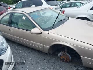 ✅ 1997 Ford Thunderbird LX • VIN: 1FALP6246VH135168 • Лот: 42758066. Опубликован ранее на IAAI с пробегом 148 908 миль. Бесплатный доступ к архиву аукционных продаж из США и подробный отчёт об истории автомобиля на DreamBid. Изображение 1.