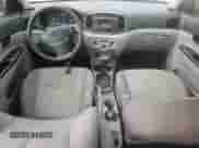 2010 Hyundai Accent GLS z VIN KMHCN4AC6AU500703, wystawiony jako Copart lot #82541114 z przebiegiem 188 357 mil mil oraz Szkoda całkowita • Salvage title. Historia ofert i sprzedaży dostępna na DreamBid. Obrazek 8.