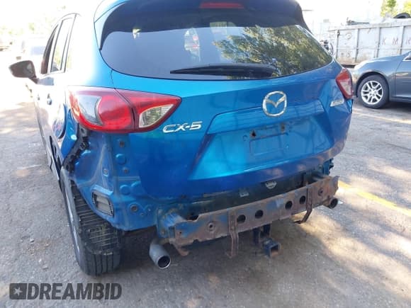 ✅ 2014 Mazda CX-5 Sport • VIN: JM3KE2BE7E0332563 • Lot: 42770891. Listed on IAAI with 145,924 mi. Free auction sales archive from the USA and detailed vehicle history report at DreamBid. Image 6.