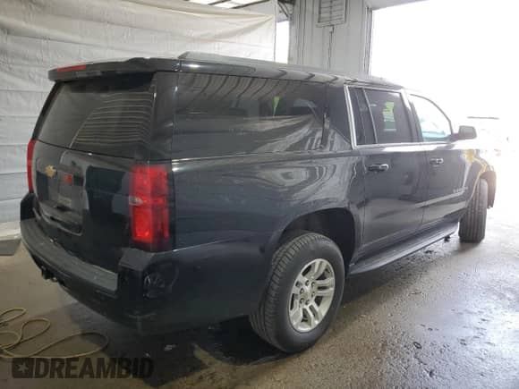 2018 Chevrolet Suburban LS z VIN 1GNSKGEC9JR393340, wystawiony jako Copart lot #56316665 z przebiegiem 104 751 mil mil oraz Szkoda całkowita • Salvage title. Historia ofert i sprzedaży dostępna na DreamBid. Obrazek 3.