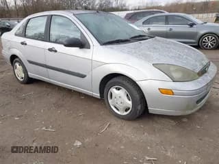 ✅ 2003 Ford Focus LX • VIN: 1FAFP33P63W133031 • Lot: 43895509. Listed on IAAI with Not provided. Free auction sales archive from the USA and detailed vehicle history report at DreamBid. Image 1.