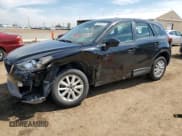 ✅ 2014 Mazda CX-5 Sport • VIN: JM3KE2BE0E0335126 • Lot: 56555315. Listed on Copart with 116,718 mi. Free auction sales archive from the USA and detailed vehicle history report at DreamBid. Image 1.