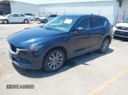 ✅ 2019 Mazda CX-5 Grand Touring • VIN: JM3KFADM6K1631110 • Lot: 42615837. Listed on IAAI with 63,764 mi. Free auction sales archive from the USA and detailed vehicle history report at DreamBid. Image 17.