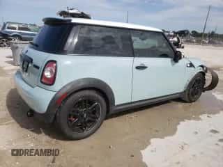 2012 MINI Hardtop with VIN WMWSU3C52CT367682, listed as a Copart auction lot 63045965 with 124,683 mi miles and Salvage title. Bid and sale history available at DreamBid. Image 3.
