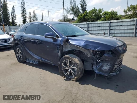 ✅ 2023 Lexus RX 350 • VIN: 2T2BAMBA7PC015691 • Lot: 57328005. Wystawiony na Copart z przebiegiem Nie podano. Bezpłatny archiwum sprzedaży aukcyjnych z USA i szczegółowy raport historii pojazdu na DreamBid. Zdjęcie 4.