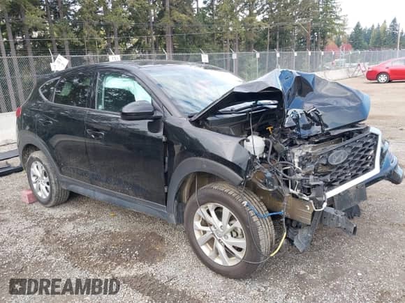 2019 Hyundai Tucson SE z VIN KM8J2CA47KU883670, wystawiony jako IAAI lot #43503613 z przebiegiem 51 899 mil mil oraz . Historia ofert i sprzedaży dostępna na DreamBid. Obrazek 1.