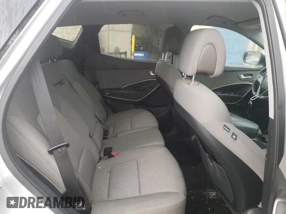 ✅ 2017 Hyundai Santa Fe 2.4L • VIN: 5XYZTDLB7HG438832 • Лот: 56296393. Опубликован ранее на Copart с пробегом 99 528 миль. Бесплатный доступ к архиву аукционных продаж из США и подробный отчёт об истории автомобиля на DreamBid. Изображение 11.