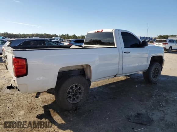 ✅ 2016 Chevrolet Silverado 1500 LS • VIN: 1GCNCNEH4GZ215458 • Лот: 46884785. Опубликован ранее на Copart с пробегом 129 199 миль. Бесплатный доступ к архиву аукционных продаж из США и подробный отчёт об истории автомобиля на DreamBid. Изображение 3.