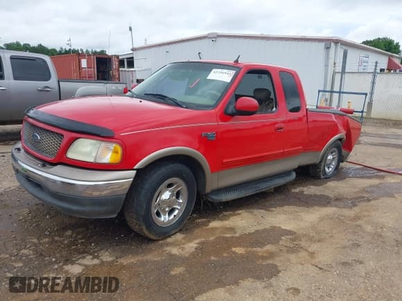 ✅ 2002 Ford F-150 XL • VIN: 1FTRX17L32NC03527 • Lot: 42356945. Listed on IAAI with Not provided. Free auction sales archive from the USA and detailed vehicle history report at DreamBid. Image 2.