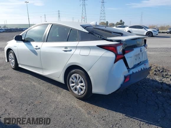 ✅ 2020 Toyota Prius LE • VIN: JTDKARFU6L3120442 • Lot: 43402603. Listed on IAAI with 77,570 mi. Free auction sales archive from the USA and detailed vehicle history report at DreamBid. Image 3.
