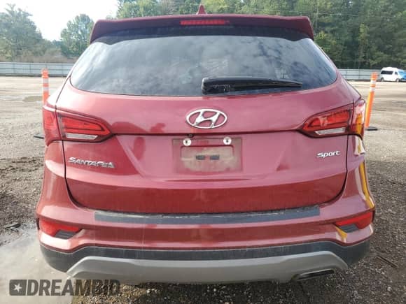 2017 Hyundai Santa Fe 2.4L z VIN 5XYZU3LB6HG471750, wystawiony jako Copart lot #81209935 z przebiegiem Nie podano mil oraz Szkoda całkowita • Salvage title. Historia ofert i sprzedaży dostępna na DreamBid. Obrazek 6.