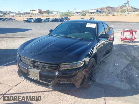 2018 Dodge Charger SXT Plus with VIN 2C3CDXHG6JH174345, listed as a IAAI auction lot 43388377 with 76,831 mi miles and . Bid and sale history available at DreamBid. Image 2.
