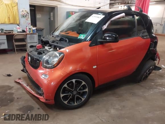 ✅ 2016 Smart fortwo Passion • VIN: WMEFJ5DA4GK045241 • Lot: 42553463. Wystawiony na IAAI z przebiegiem 66 775 mil. Bezpłatny archiwum sprzedaży aukcyjnych z USA i szczegółowy raport historii pojazdu na DreamBid. Zdjęcie 2.