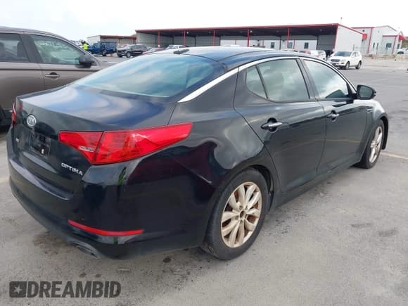✅ 2014 Kia Optima EX • VIN: 5XXGN4A77EG346247 • Лот: 43730028. Опубликован ранее на IAAI с пробегом 162 115 миль. Бесплатный доступ к архиву аукционных продаж из США и подробный отчёт об истории автомобиля на DreamBid. Изображение 4.