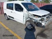 ✅ 2021 Ford Transit Connect XL • VIN: NM0LS7E22M1489556 • Lot: 43719740. Listed on IAAI with 104,181 mi. Free auction sales archive from the USA and detailed vehicle history report at DreamBid. Image 1.