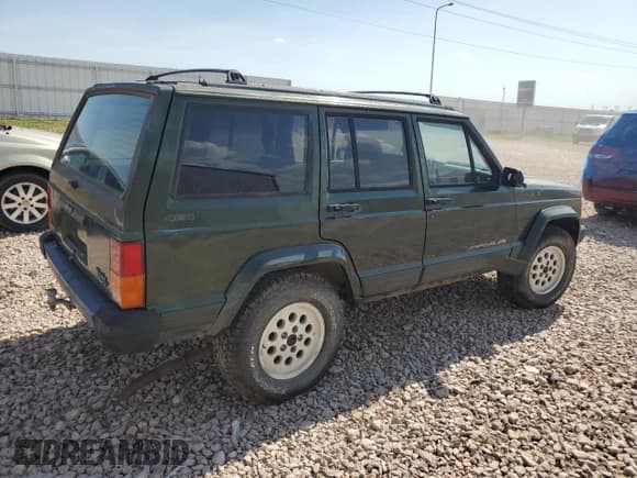 ✅ 1996 Jeep Cherokee Sport • VIN: 1J4FJ68S0TL326491 • Лот: 61977575. Опубликован ранее на Copart с пробегом 264 507 миль. Бесплатный доступ к архиву аукционных продаж из США и подробный отчёт об истории автомобиля на DreamBid. Изображение 3.
