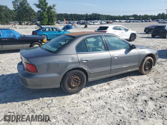 ✅ 2003 Mitsubishi Galant ES • VIN: 4A3AA46G03E042881 • Lot: 61861195. Wystawiony na Copart z przebiegiem 139 049 mil. Bezpłatny archiwum sprzedaży aukcyjnych z USA i szczegółowy raport historii pojazdu na DreamBid. Zdjęcie 3.