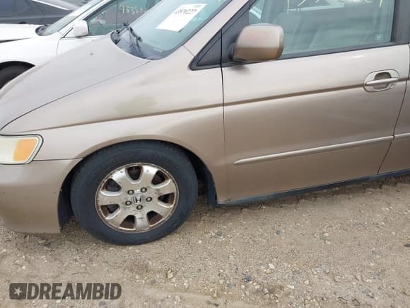 ✅ 2003 Honda Odyssey EX-L • VIN: 5FNRL18013B006498 • Лот: 43570227. Опубликован ранее на IAAI с пробегом 244 528 миль. Бесплатный доступ к архиву аукционных продаж из США и подробный отчёт об истории автомобиля на DreamBid. Изображение 6.