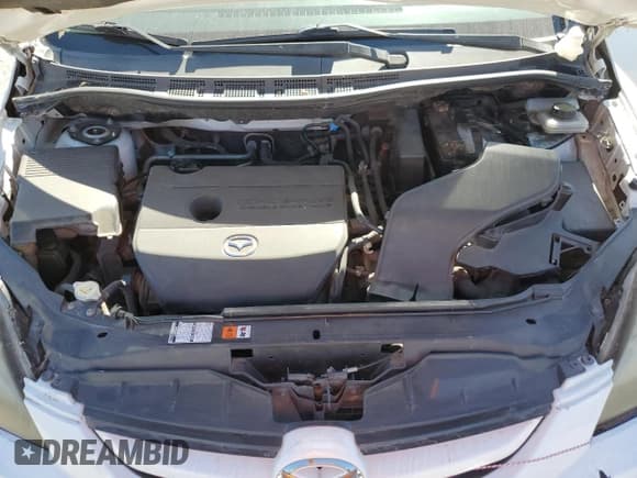 ✅ 2008 Mazda 5 Grand Touring • VIN: JM1CR293080306011 • Лот: 67790355. Опубликован ранее на Copart с пробегом 164 903 миль. Бесплатный доступ к архиву аукционных продаж из США и подробный отчёт об истории автомобиля на DreamBid. Изображение 12.