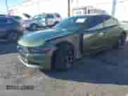 2022 Dodge Charger SXT with VIN 2C3CDXBG5NH202361, listed as a IAAI auction lot 43406992 with 34,449 mi miles and . Bid and sale history available at DreamBid. Image 2.