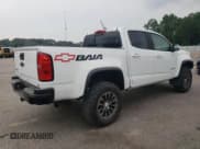 ✅ 2018 Chevrolet Colorado 4WD ZR2 • VIN: 1GCPTEE19J1104017 • Лот: 62305195. Опубликован ранее на Copart с пробегом 153 018 миль. Бесплатный доступ к архиву аукционных продаж из США и подробный отчёт об истории автомобиля на DreamBid. Изображение 3.